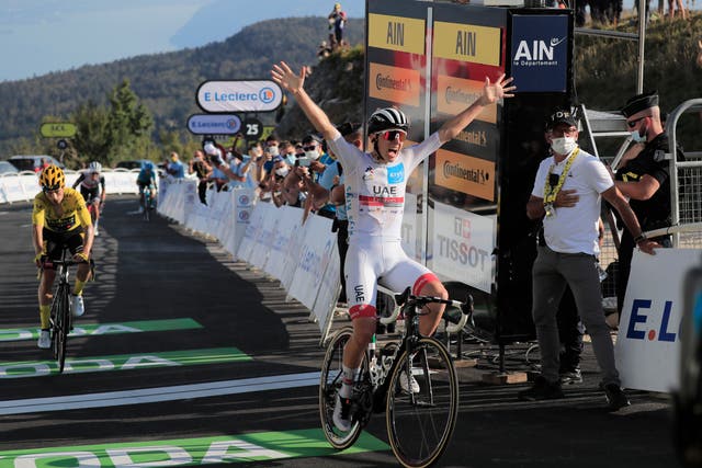 Tadej Pogacar celebrates clinching his second stage win of the Tour