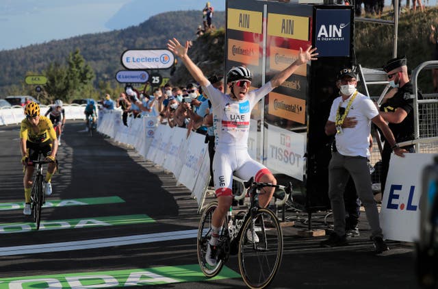 Tadej Pogacar celebrates clinching his second stage win of the Tour