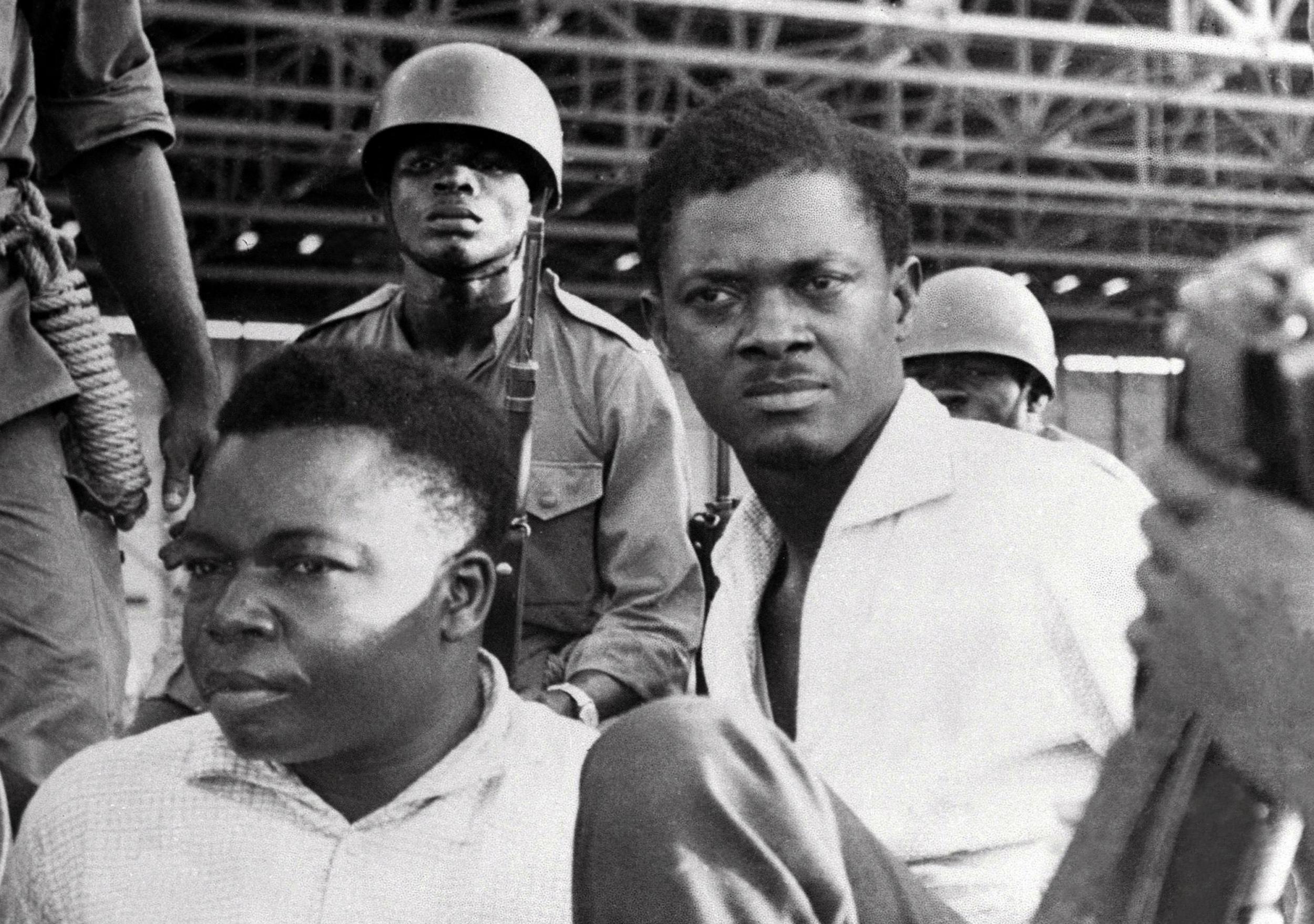 A picture taken in December 1960, shows soldiers guarding Patrice Lumumba (R), Prime Minister of then Congo-Kinshasa.