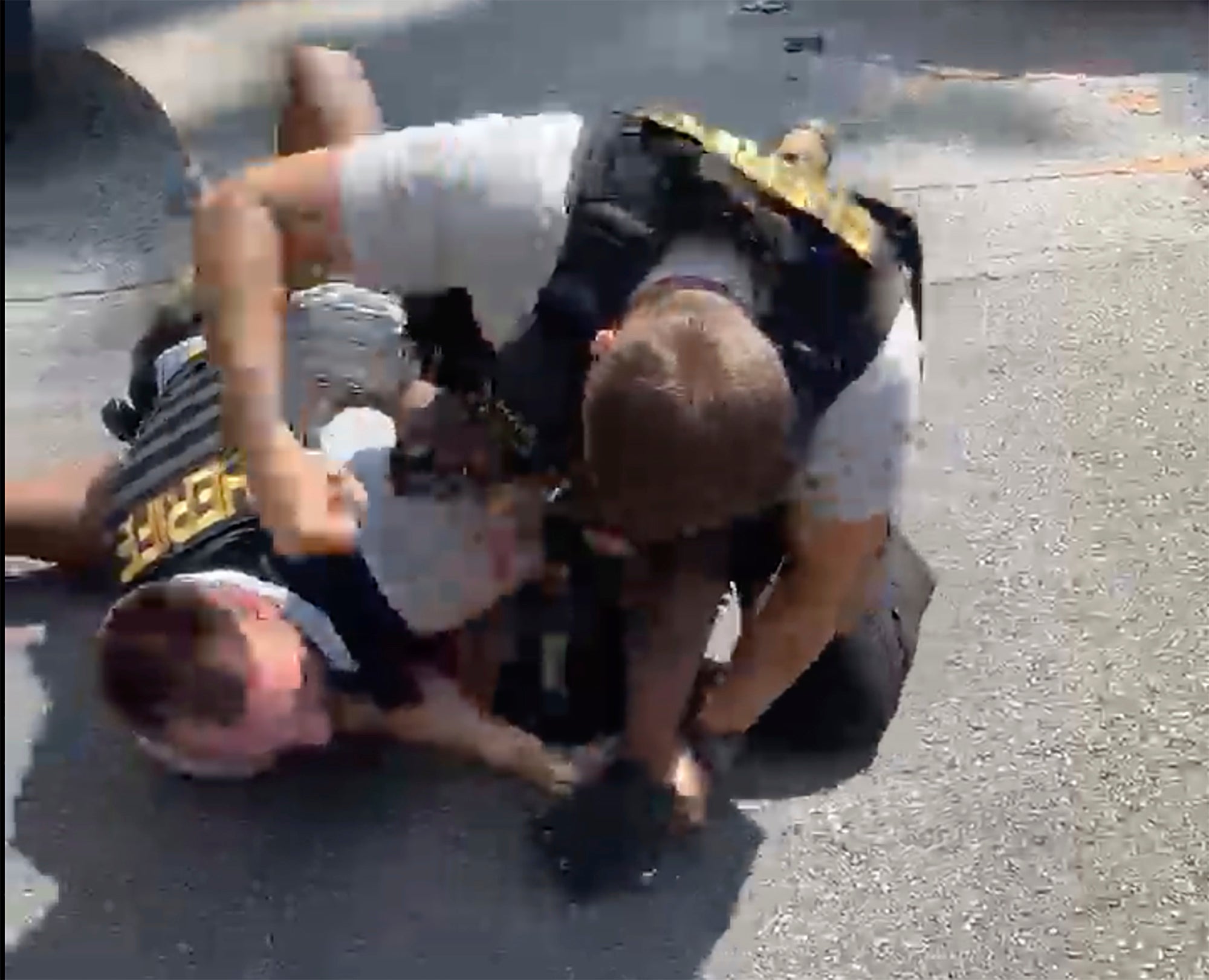 A screen grab from a video shows a Clayton County deputy punching Roderick Williams during a traffic stop