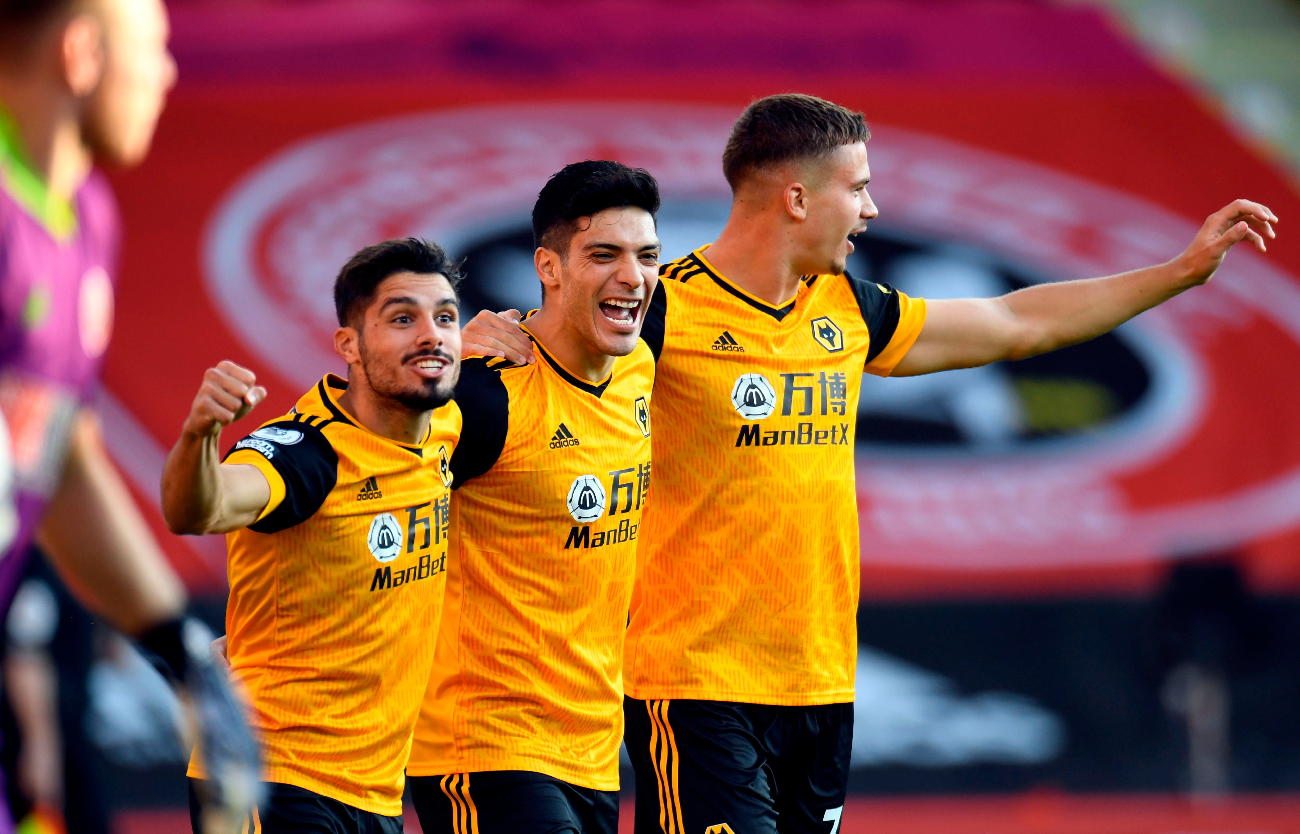 Wolves celebrate after Raul Jimenez, centre, scored their opener