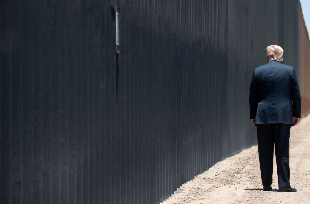 President Donald Trump participates in a ceremony commemorating the 200th mile of border wall at the international border with Mexico