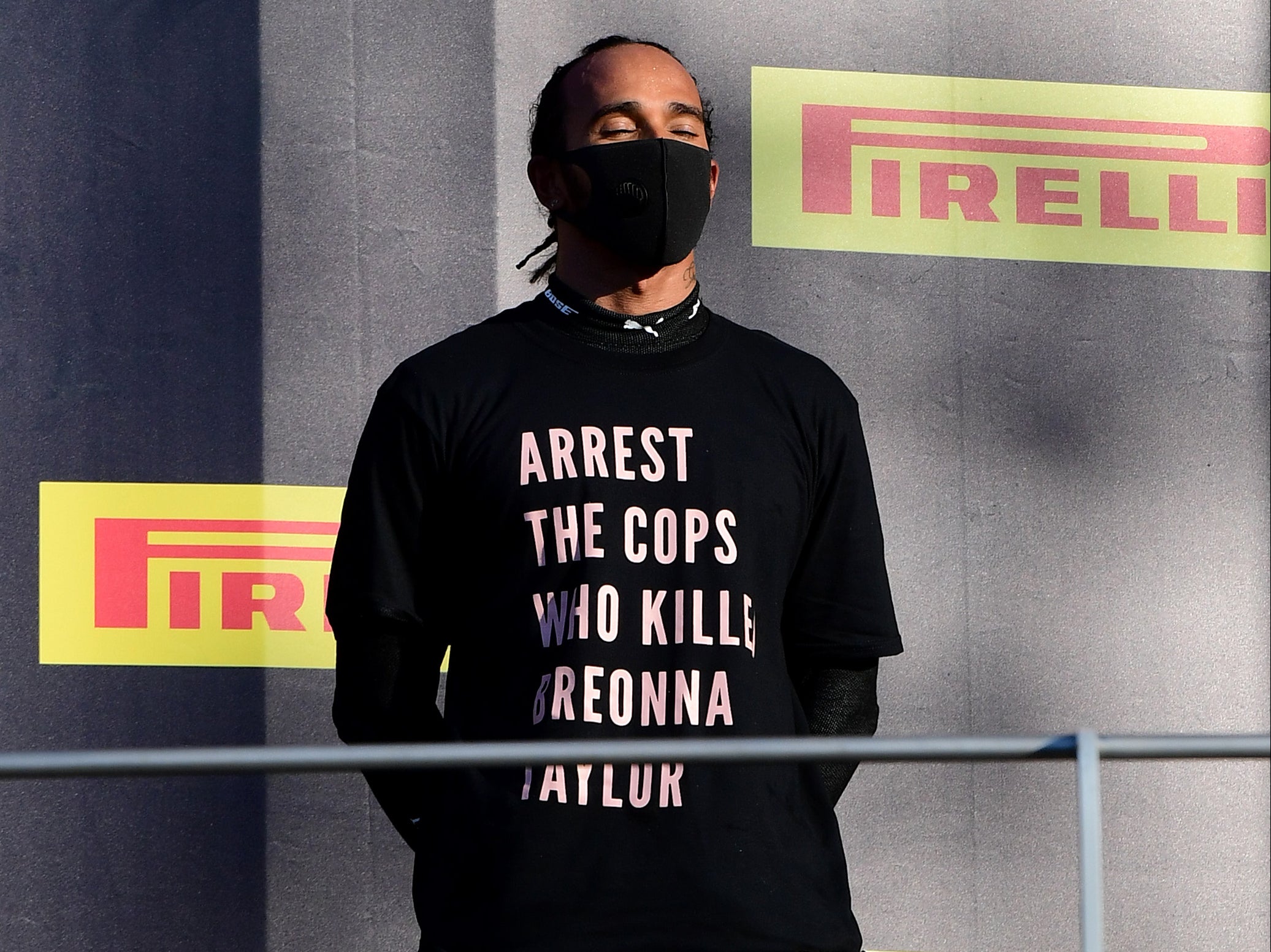 Lewis Hamilton sporting the anti-racism T-shirt on the Mugello podium