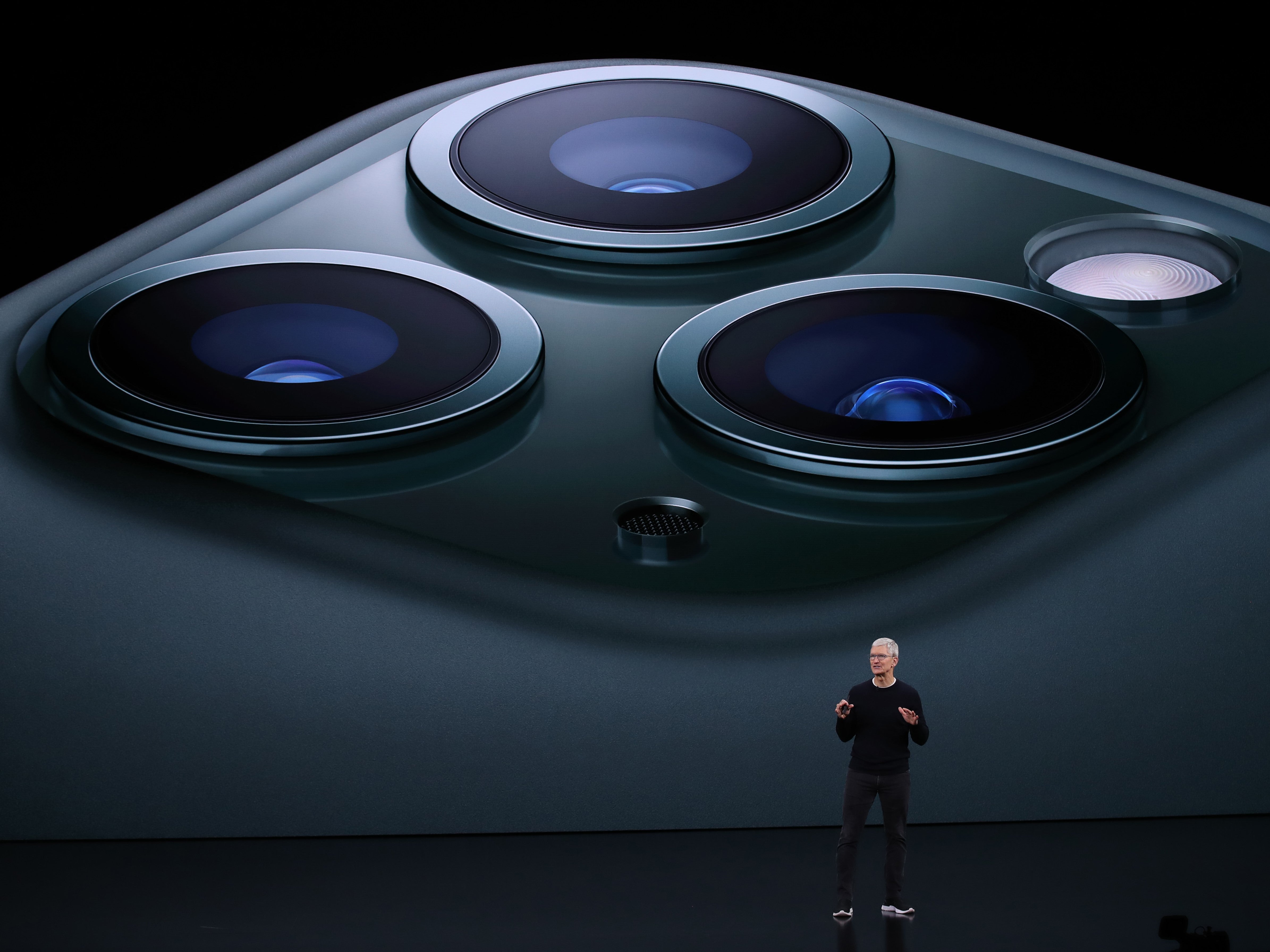Apple CEO Tim Cook unveils the iPhone 11 Pro during the 2019 event in Cupertino, California