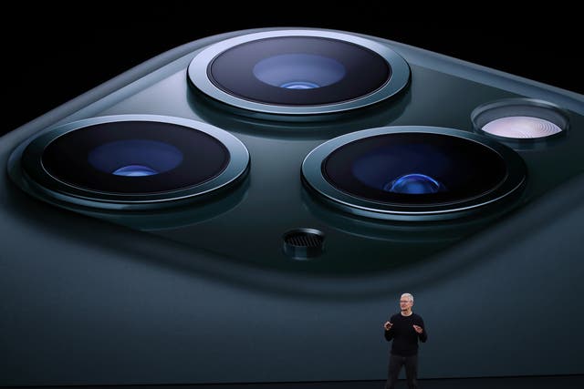 Apple CEO Tim Cook unveils the iPhone 11 Pro during  the 2019 event in Cupertino, California