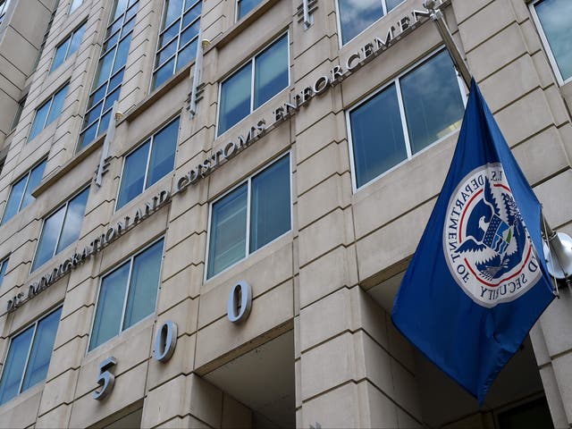 the Department of Homeland Security flag flies outside the Immigration and Customs Enforcement (ICE) headquarters in Washington, DC
