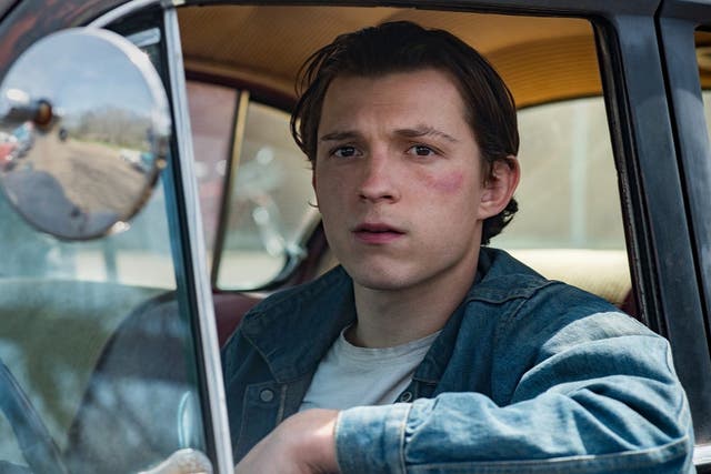 Tom Holland works to shed his trademark earnestness in Netflix’s unsettling ‘The Devil All the Time’