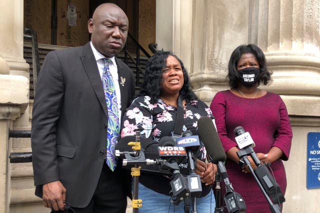 Breonna Taylor's mother Tamika Palmer, centre, discusses historic $12m settlement from city after daughter's killing by Louisville police.
