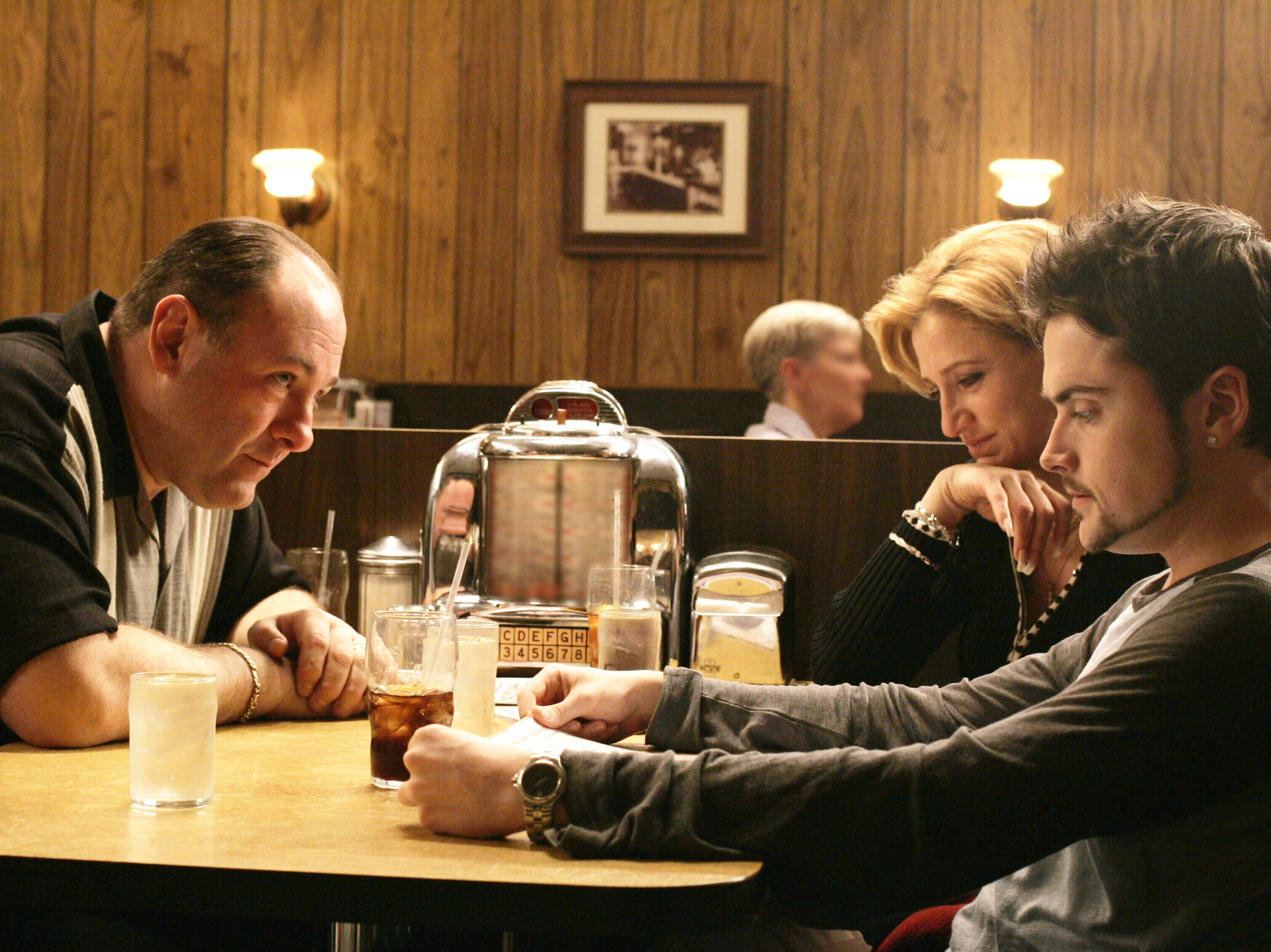 Don’t stop believing: Tony (James Gandolfini), Carmela (Edie Falco) and AJ (Robert Iler) enjoy a final family dinner