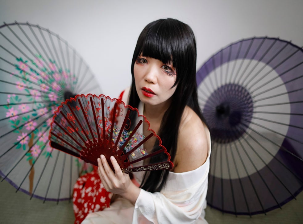 Ai Kaneko poses after she was transformed into a sex doll