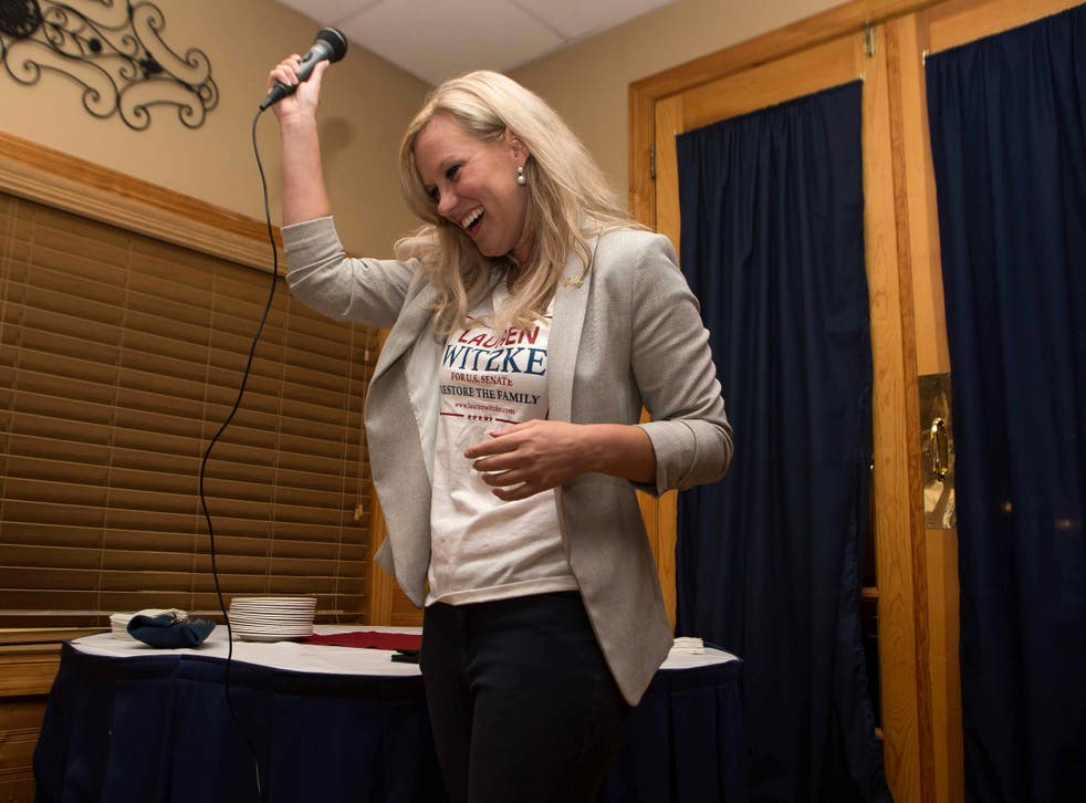 Lauren Witzke celebrates after winning Delaware's Republican US Senate primary