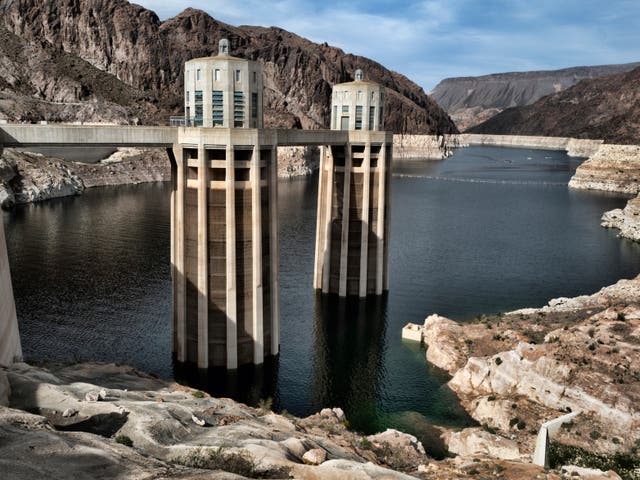 A March 2019 photo shows a bathtub ring of light minerals showing the high-water mark of the reservoir which has shrunk to its lowest point on the Colorado River, as seen from the Hoover Dam, Arizona 