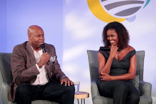 Michelle Obama (pictured in October 2019) hosts her brother Craig Robinson on her Spotify podcast 