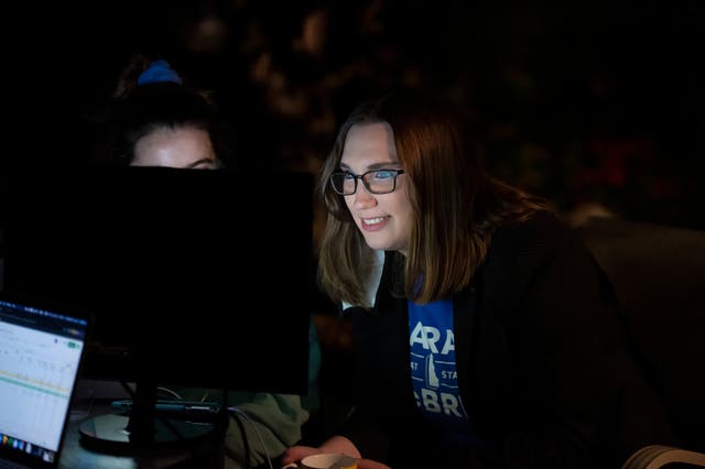 Transgender activist Sarah McBride watches a computer screen at her watch party in Wilmington, Delaware on 15 September 2020