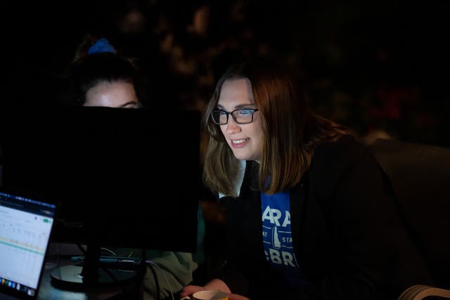 Transgender activist Sarah McBride watches a computer screen at her watch party in Wilmington, Delaware on 15 September 2020