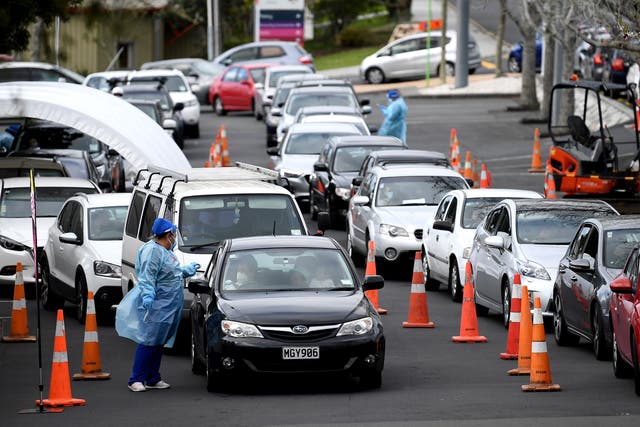 People wait to get a Covid-19 test at the Northcote Covid-19 testing facility in Auckland on September 14 as the city remains on Alert Level 2.5 