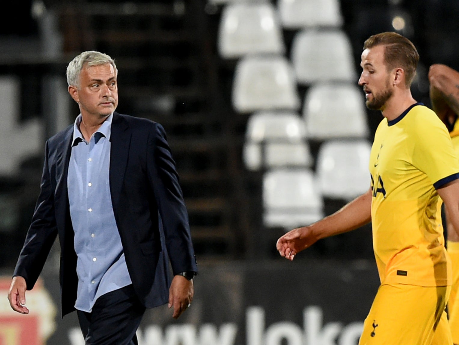 Tottenham coach Jose Mourinho and goalscorer Harry Kane show their relief