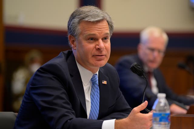 <p>Christopher Wray, appointed by Donald Trump in June 2017, has angered the president by failing to investigate election fraud</p>