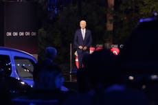 Biden calls on Trump to step down over his coronavirus response as he holds first town hall