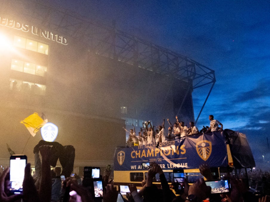 Leeds lift the trophy outside Elland Road