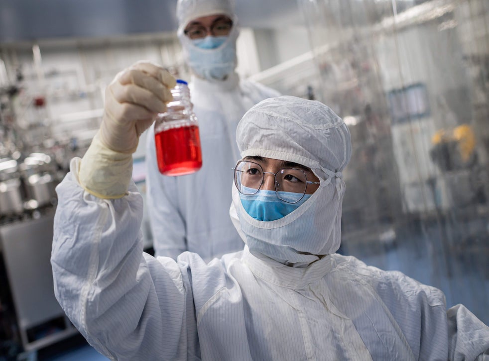 Scientists work on Covid-19 vaccine at Sinovac Biotech facilities in Beijing