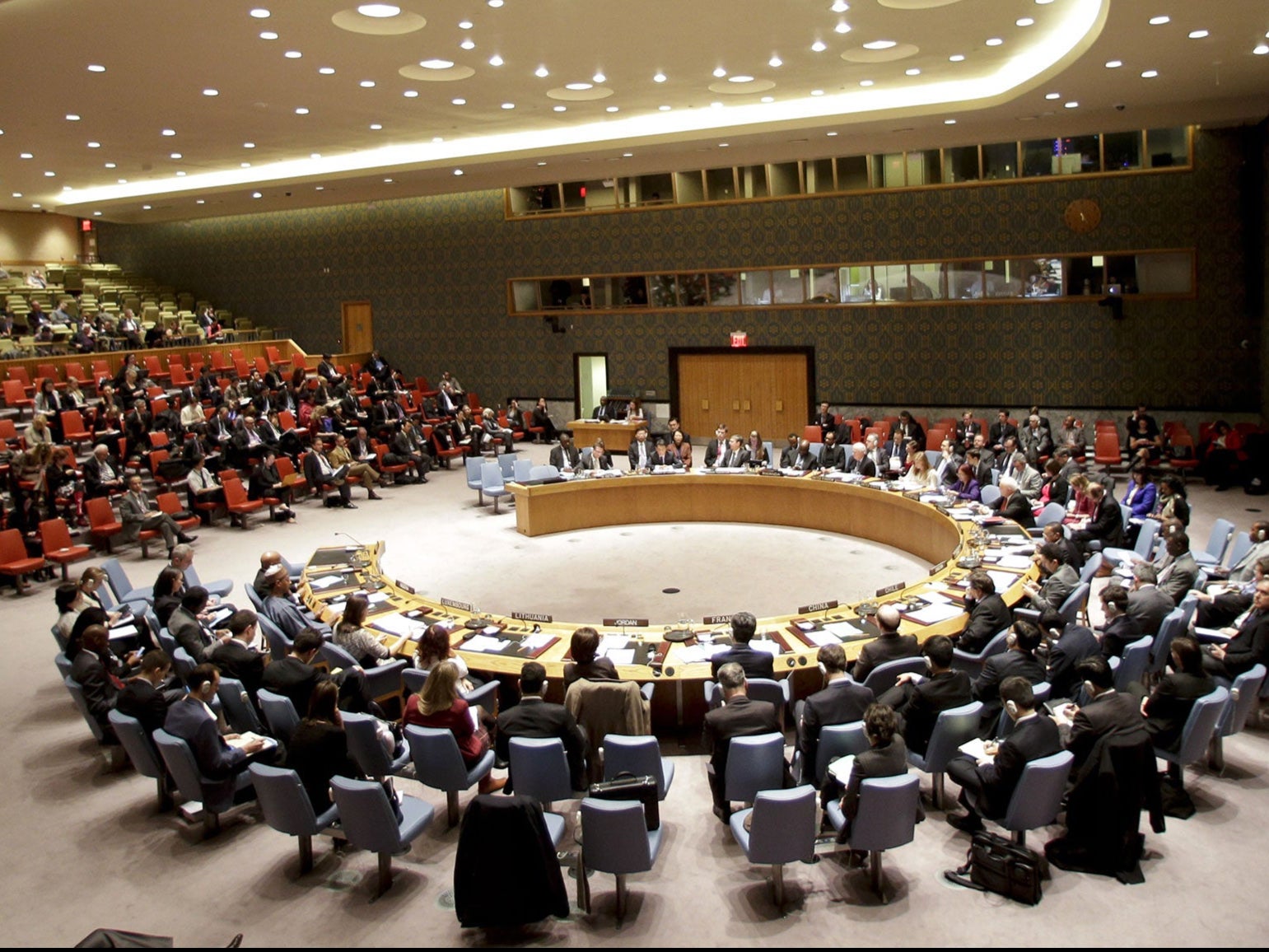 The UN Security Council listens to South Korea's United Nations Ambassador Oh Joon during a meeting Monday, Dec 22, 2014