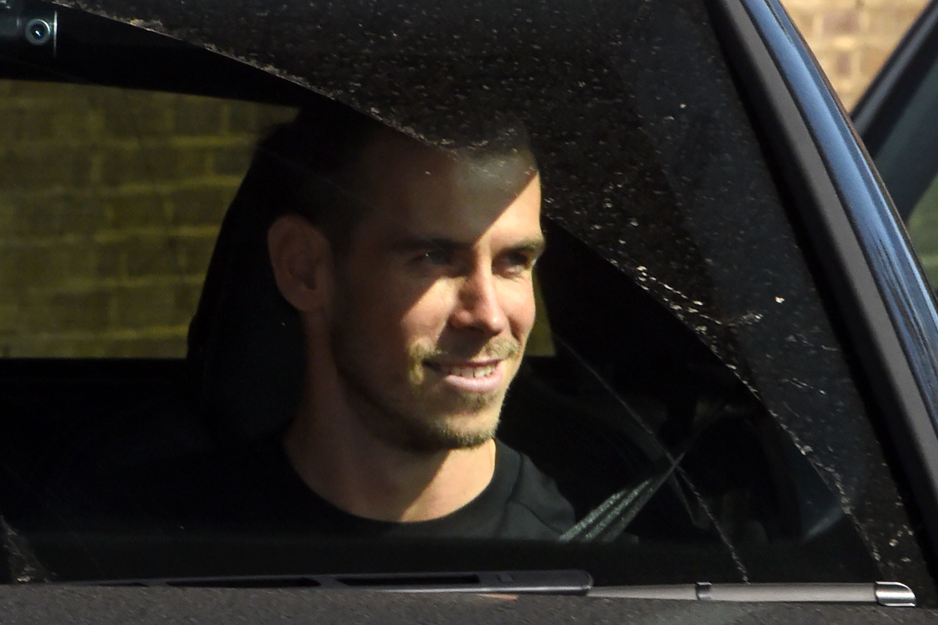 Gareth Bale arrives at Spurs' training ground yesterday