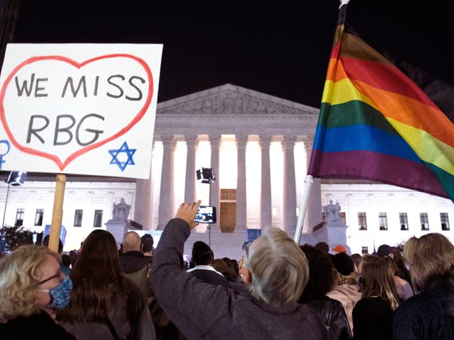 People gathered at the Supreme Court building in Washington on Friday night after the death of Justice Ruth Bader Ginsburg.
