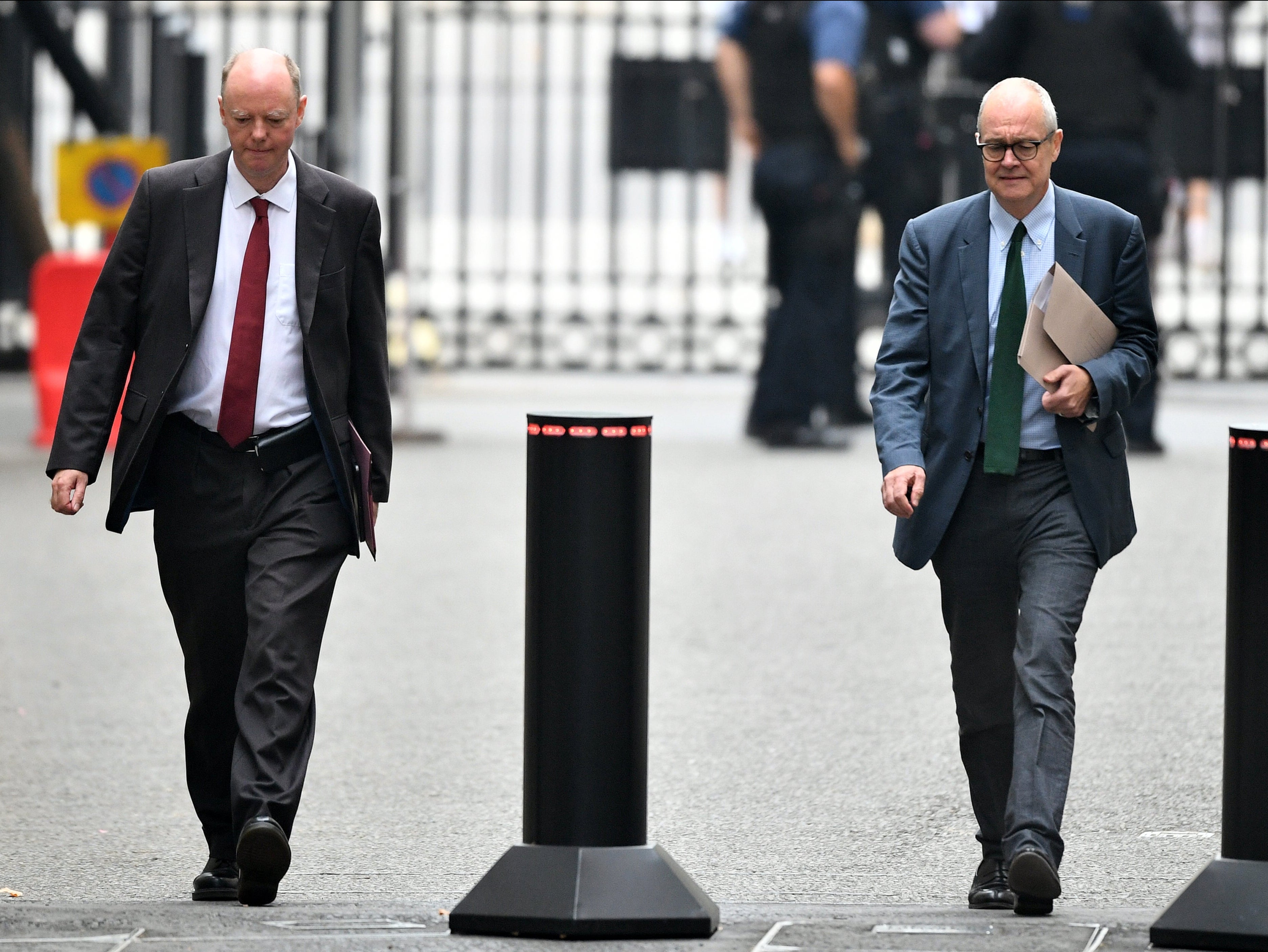 Chris Whitty and Sir Patrick Vallance arrive at Downing Street to deliver a briefing