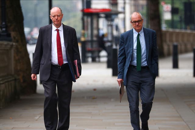 <p>MPs have been demanding answers from Chris Whitty (left) and Patrick Vallance</p>