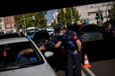 Madrid adopts virus restrictions exposing poor-rich divide