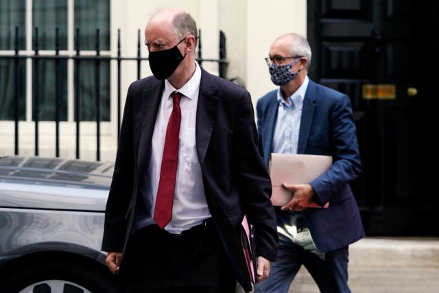 Chief Medical Officer for England Chris Whitty (L) and Chief Scientific Adviser Patrick Vallance (R) leave No. 11 Downing Street