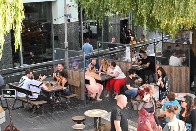 Socially distanced groups drinking at a pub in Camden, London