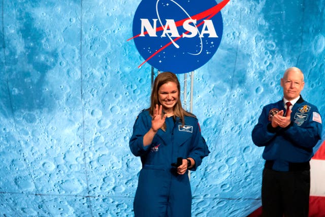 Astronaut Jasmin Moghbeli graduates at Johnson Space Center in Houston Texas, on 10 January, 2020. She is among the first to graduate under Nasa's Artemis program, which aims to begin missions to the Moon, and ultimately to Mars