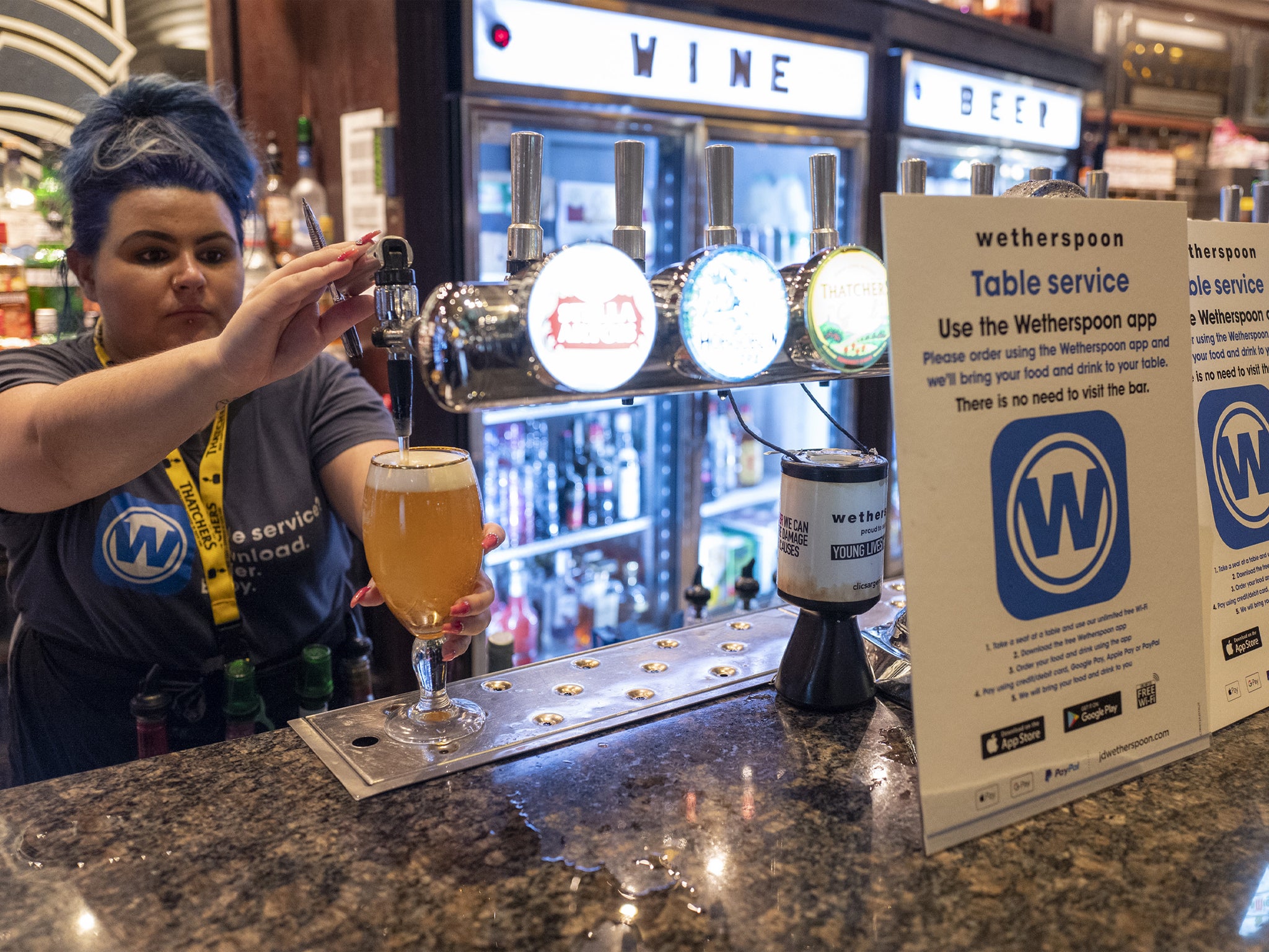 Regal Moon JD Wetherspoons pub on July 04, 2020 in Rochdale, England. The UK Government announced yesterday that pubs, restaurants and bars will have a 10pm curfew in an effort to curb coronavirus infection rates