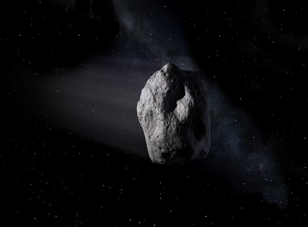Esta ilustración muestra al asteroide 2020 SW cercano a la Tierra viajando a través del espacio.