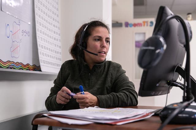 Teacher Shira Mandel instructs first grade students during a remote learning class at Stark Elementary School in Stamford, Connecticut