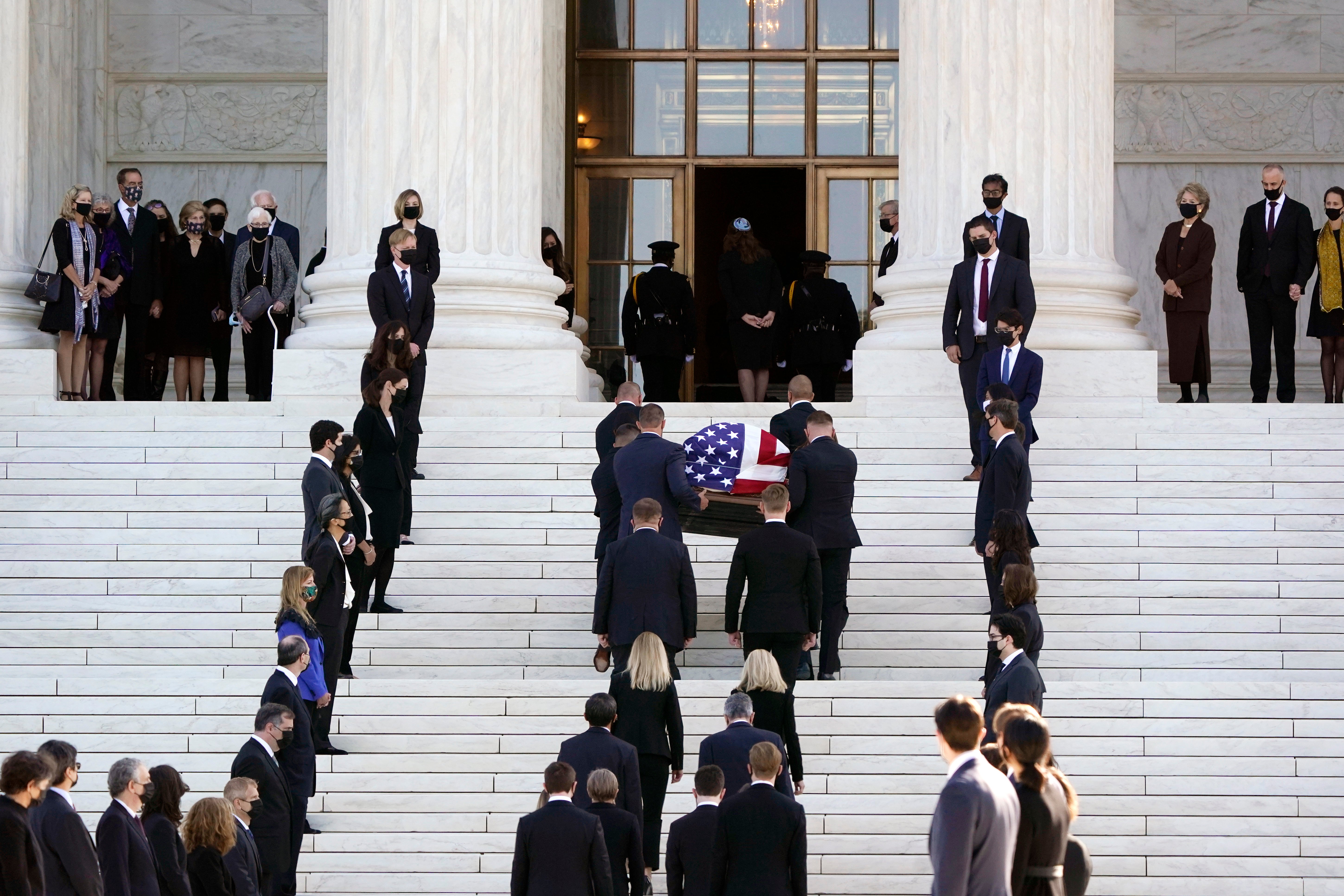 The flag-draped casket of Justice Ruth Bader Ginsburg arrives at the Supreme Court in Washington on Wednesday, 23 September, 2020