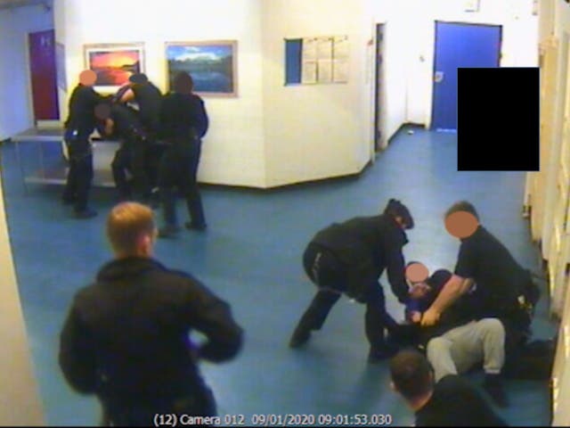 Prison officers restrain two inmates after an alleged terror attack at HMP Whitemoor in Cambridgeshire on 9 January 2020