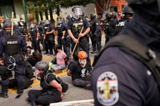 Louisville police threaten protesters with arrests, tear gas in wake of Breonna Taylor grand jury