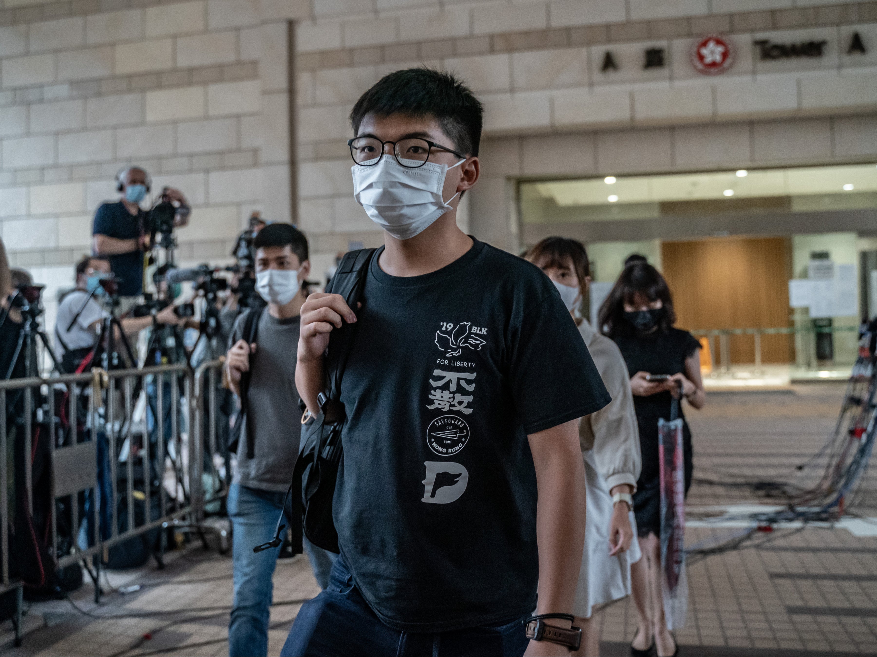 Hong Kong’s pro-democracy activist Joshua Wong leaves court after a hearing in September&nbsp;