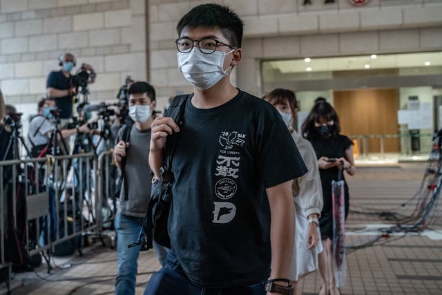 <p>Hong Kong’s pro-democracy activist Joshua Wong leaves court after a hearing in September&nbsp;</p>