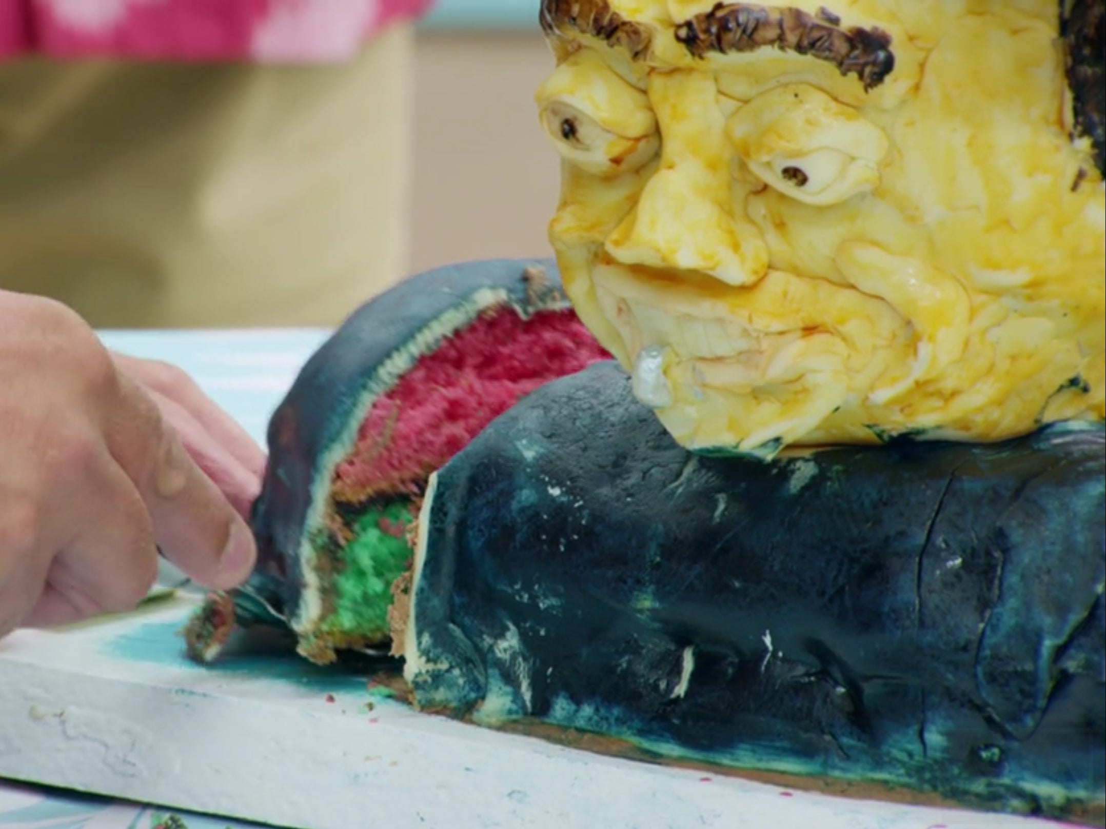 Paul Hollywood cuts into Dave's cake