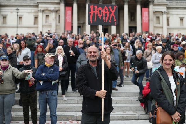 Anti-lockdown protesters, who believe that the coronavirus pandemic is a hoax, gather at the Unite For Freedom rally in Trafalgar Square, London, last month