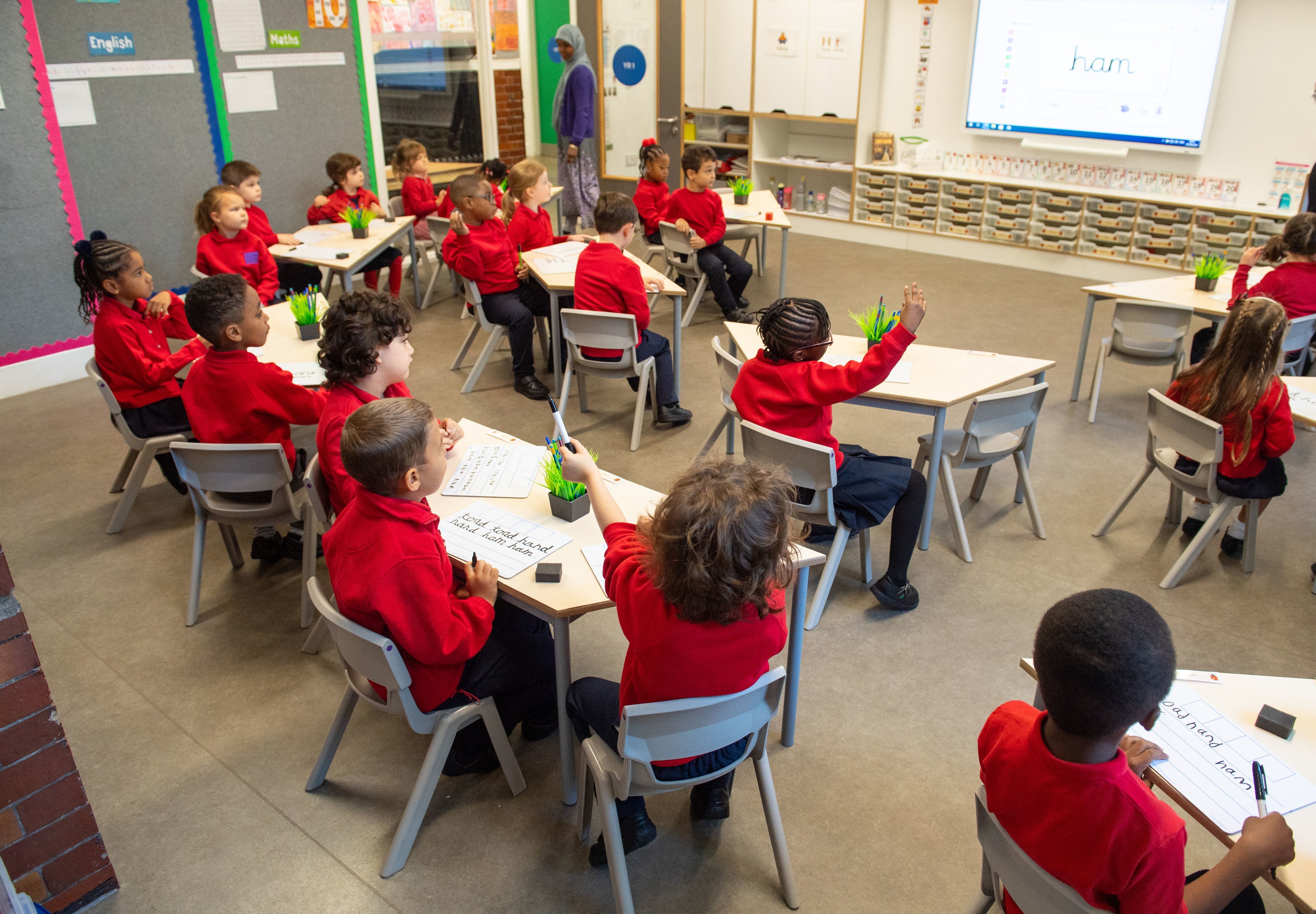 Pupils on the first day back to school at Charles Dickens Primary School in London
