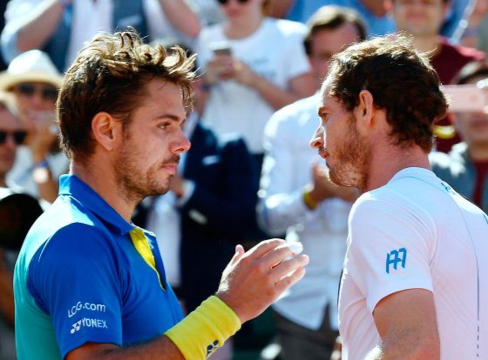 Stanislas Wawrinka is congratulated by Andy Murray in 2017