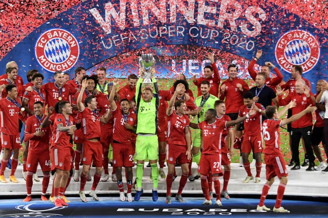 Manuel Neuer of Bayern Munich lifts the UEFA Super Cup trophy