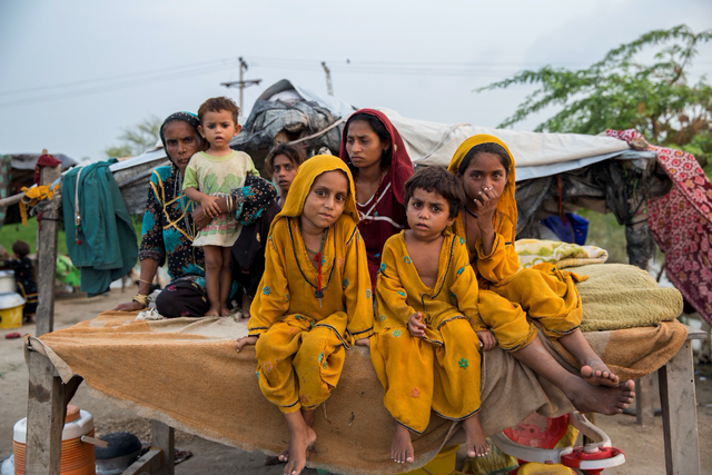 Children in a village hit hard by the floods in Badin district