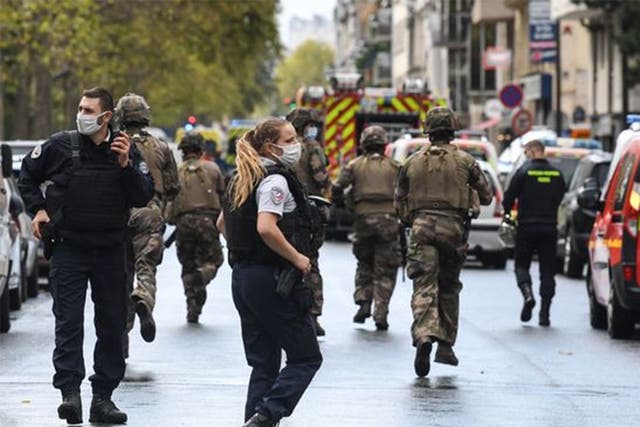 Soldiers and police at the scene on Friday