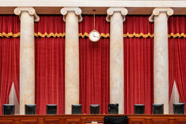 The Bench draped for the death of Associate Justice Ruth Bader Ginsburg, at the Supreme Court in Washington, DC.